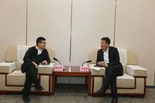 李国强会见保华控股集团客人
